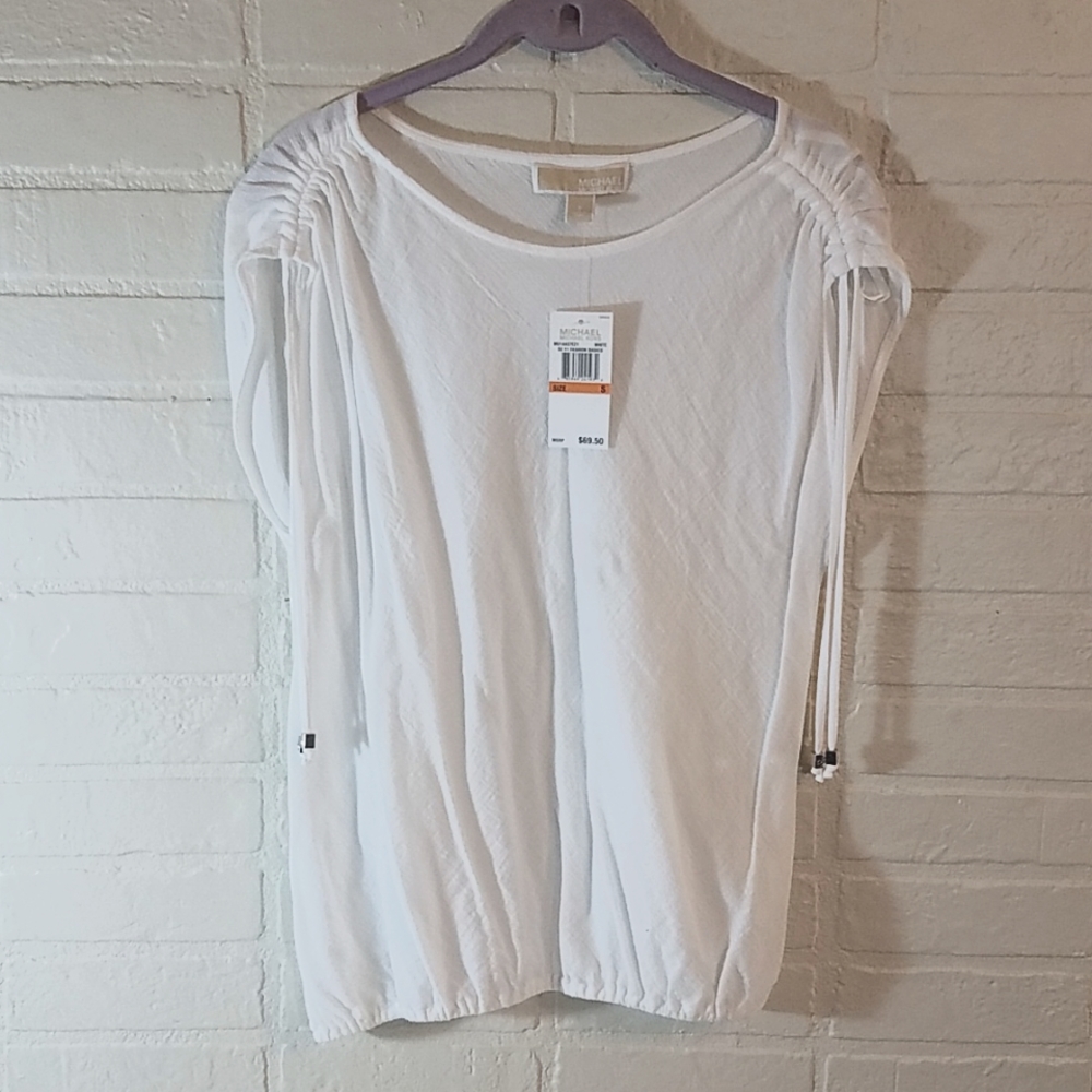Michael Kors white blouse with ruched sleeves.